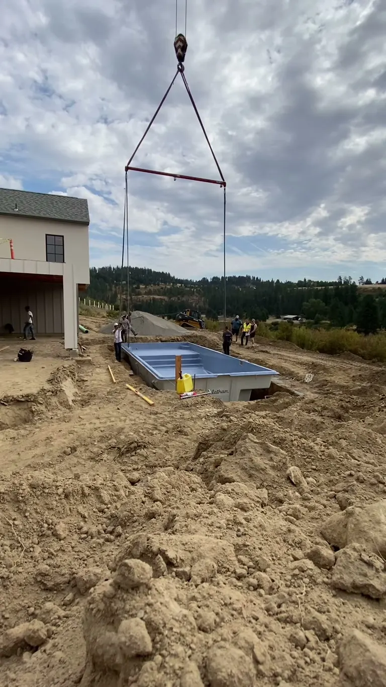 Pool construction detail showing crew progress
